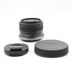 * OPEN BOX EXCELLENT * Canon EOS R100 Mirrorless Camera with RF-S 18-45mm f/4.5-6.3 IS STM Lens and RF-S 55-210mm f/5-7.1 IS STM Lens Kit at PROCAM | procam.com