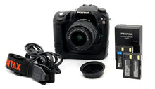 * USED * Pentax K10 DSLR Camera SHUTTER 131097 with Pentax SMC Pentax-DA 18-55mm f/ 3.5-5.6 AL Lens and Battery Grip