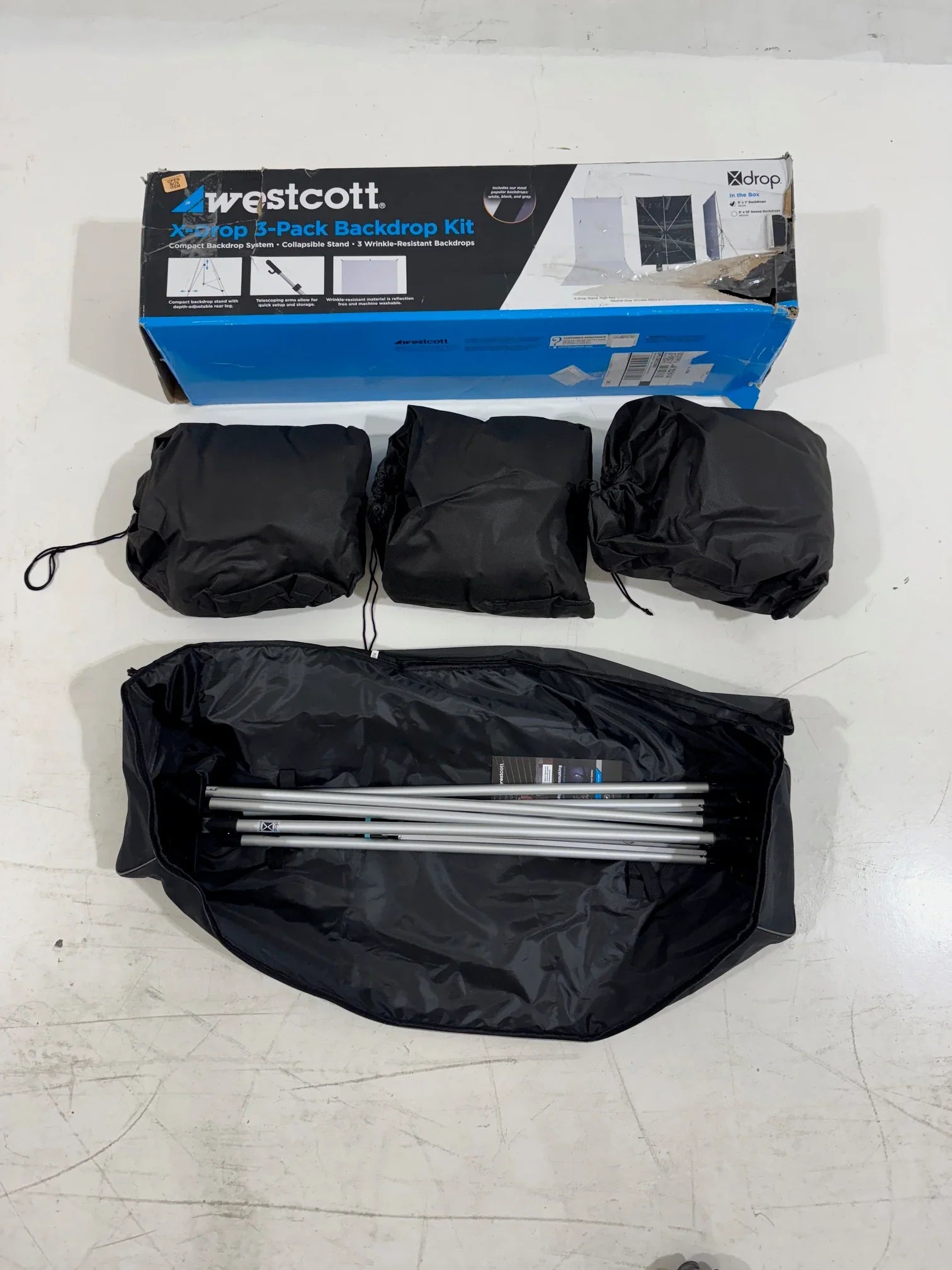 * OPEN BOX GOOD * Westcott X-Drop 3-Pack Backdrop Kit (5' x 7') at PROCAM | procam.com