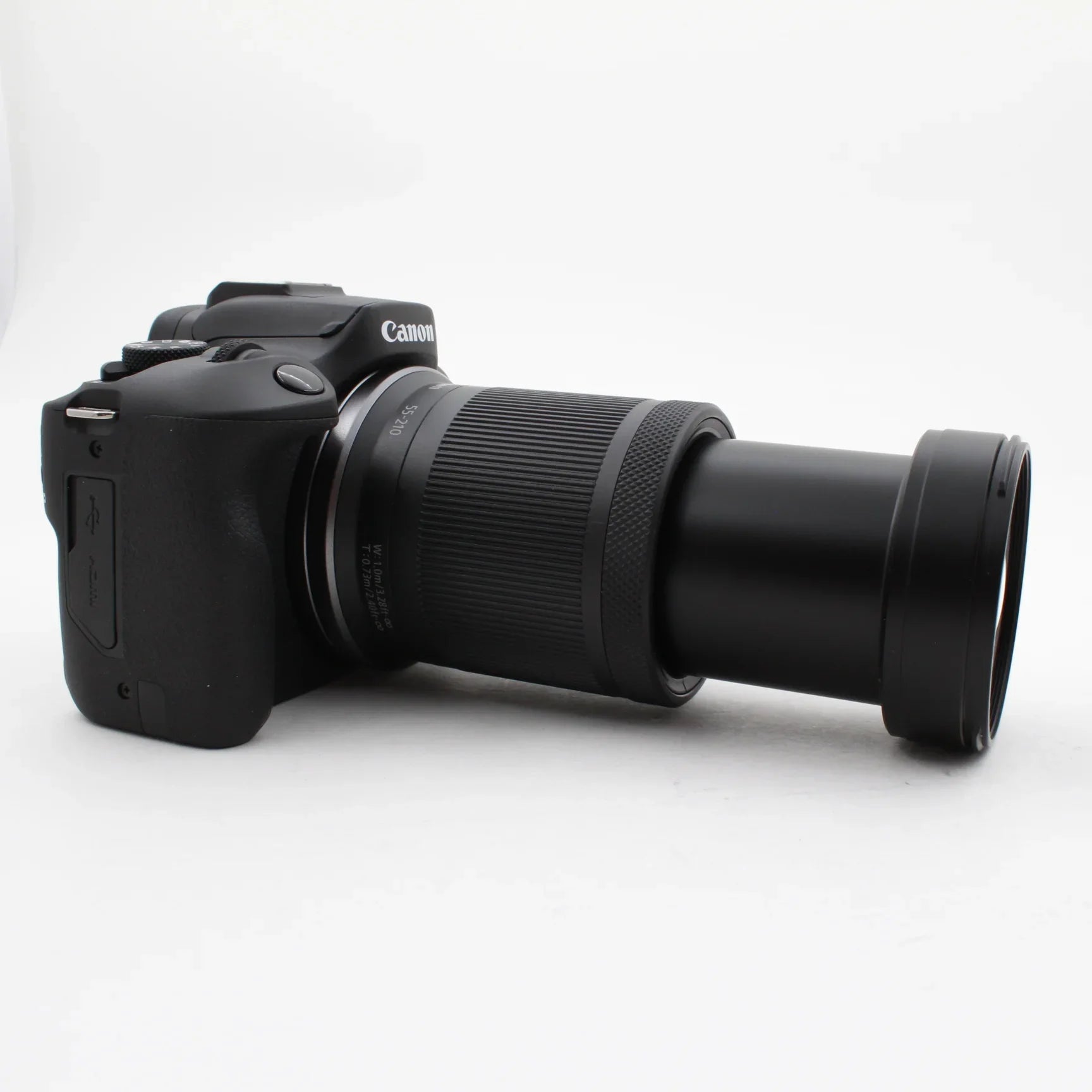 * OPEN BOX EXCELLENT * Canon EOS R100 Mirrorless Camera with RF-S 18-45mm f/4.5-6.3 IS STM Lens and RF-S 55-210mm f/5-7.1 IS STM Lens Kit at PROCAM | procam.com