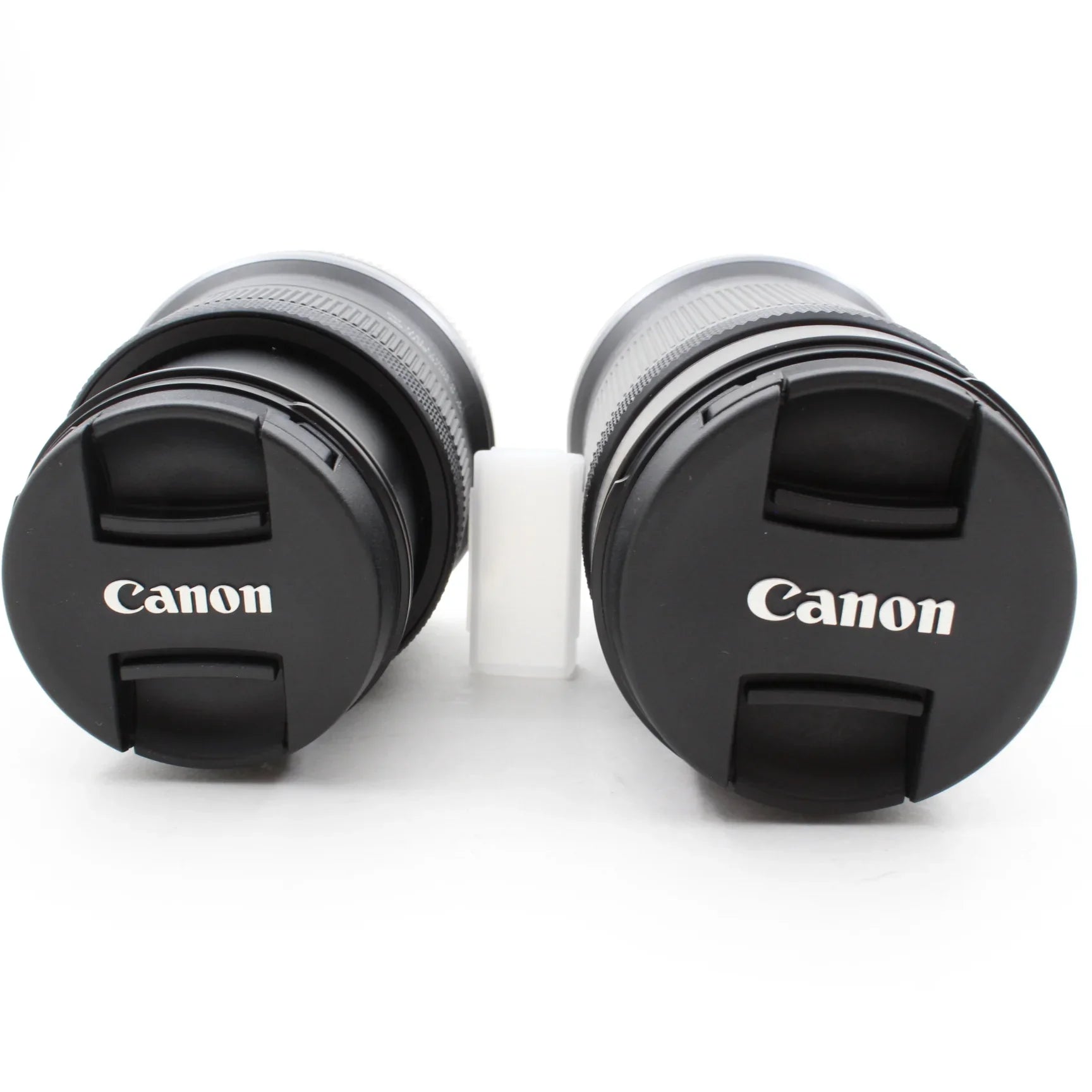 * OPEN BOX EXCELLENT * Canon EOS R100 Mirrorless Camera with RF-S 18-45mm f/4.5-6.3 IS STM Lens and RF-S 55-210mm f/5-7.1 IS STM Lens Kit at PROCAM | procam.com