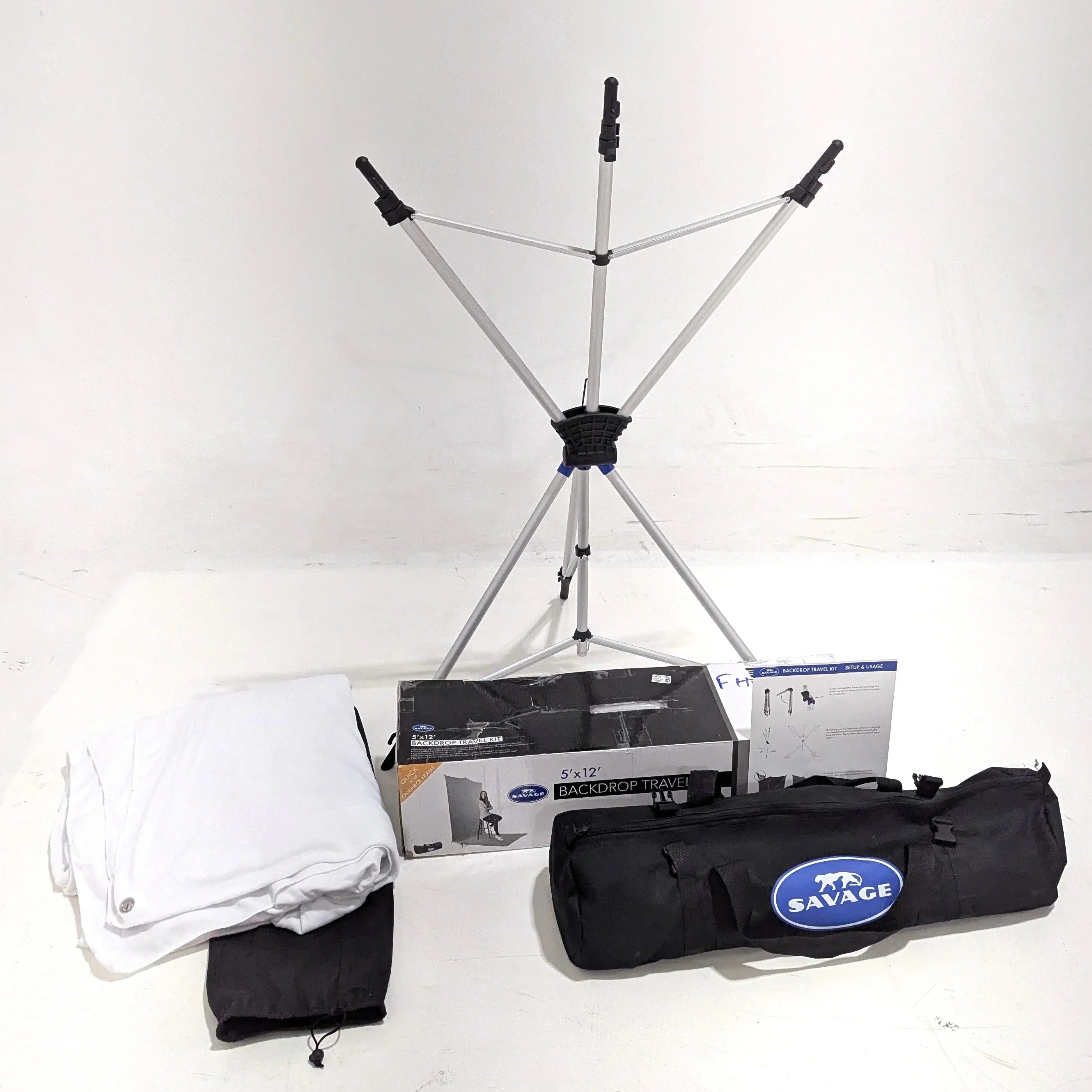 * OPEN BOX GOOD * Savage Backdrop Extended Travel Kit (White, 5 x 12') at PROCAM | procam.com